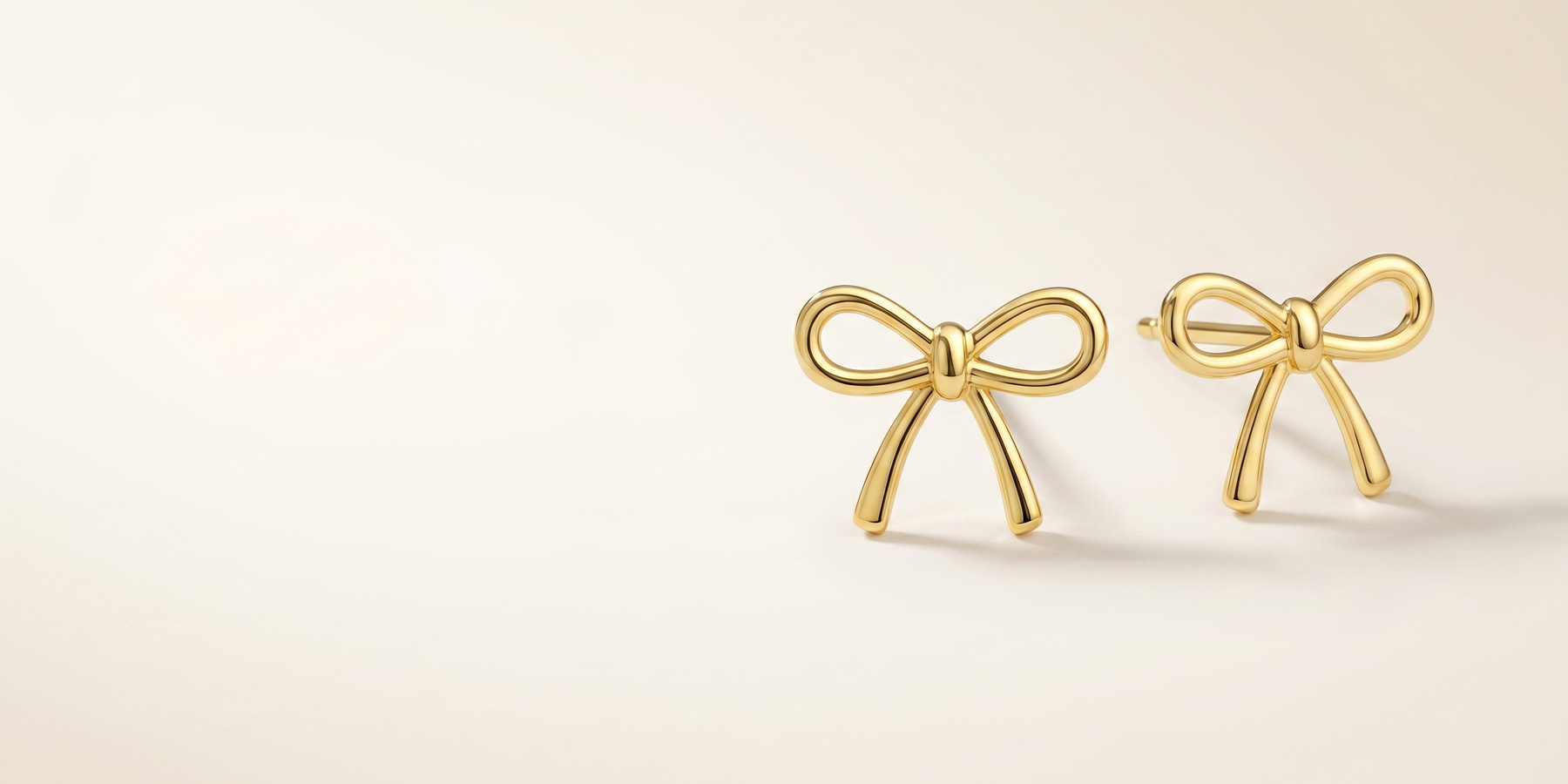 Introducing Gold Bow Stud Earrings: