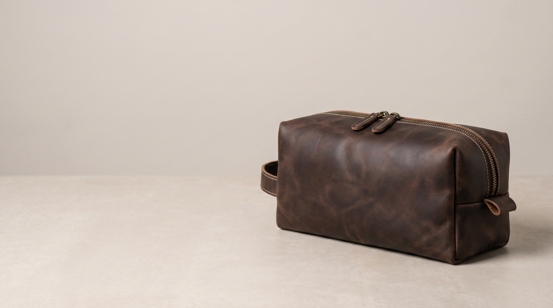 Introducing Distressed Cowhide Dopp Kit In Dark Brown: