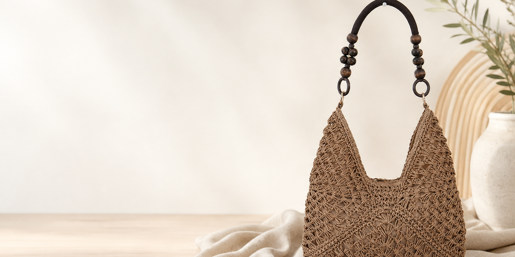 Introducing Woven Straw Shoulder Bag With a Wood Bead Handle: