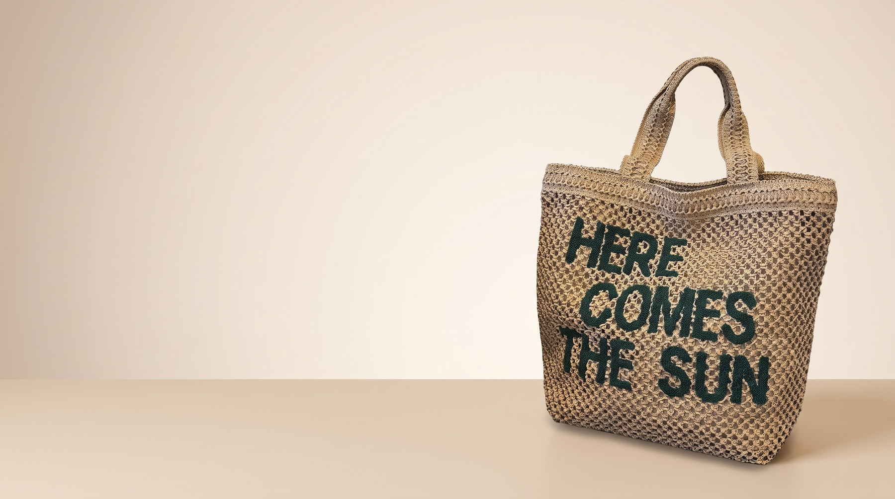 Introducing Woven Straw Tote Bag With A Here Comes The Sun Slogan Front: