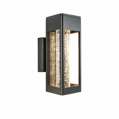 LED crystal wall sconce mounted on a wall glowing warm in soft evening light