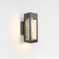 Close-up of the lit seeded acrylic crystal rod inside the wall sconce frame