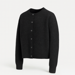 Cropped button knit cardigan styled over a fitted top in a lifestyle setting