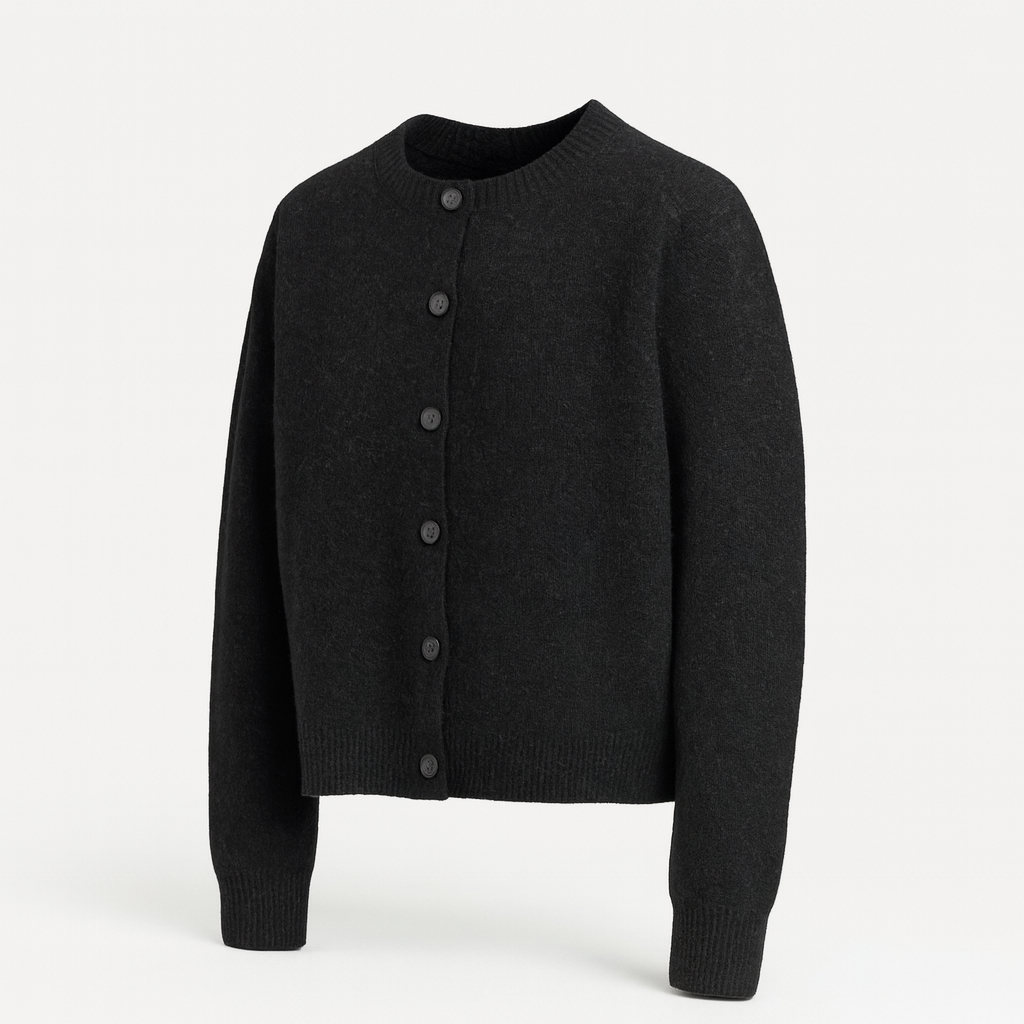 Cropped button knit cardigan styled over a fitted top in a lifestyle setting