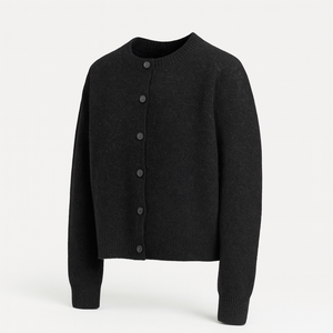Cropped button knit cardigan styled over a fitted top in a lifestyle setting