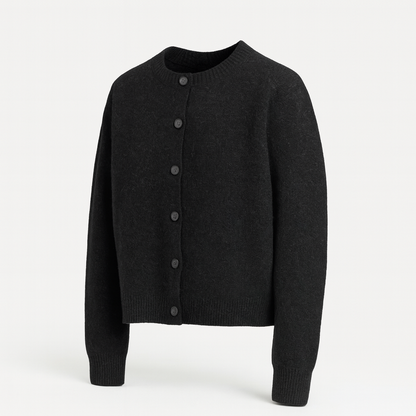 Cropped button knit cardigan styled over a fitted top in a lifestyle setting
