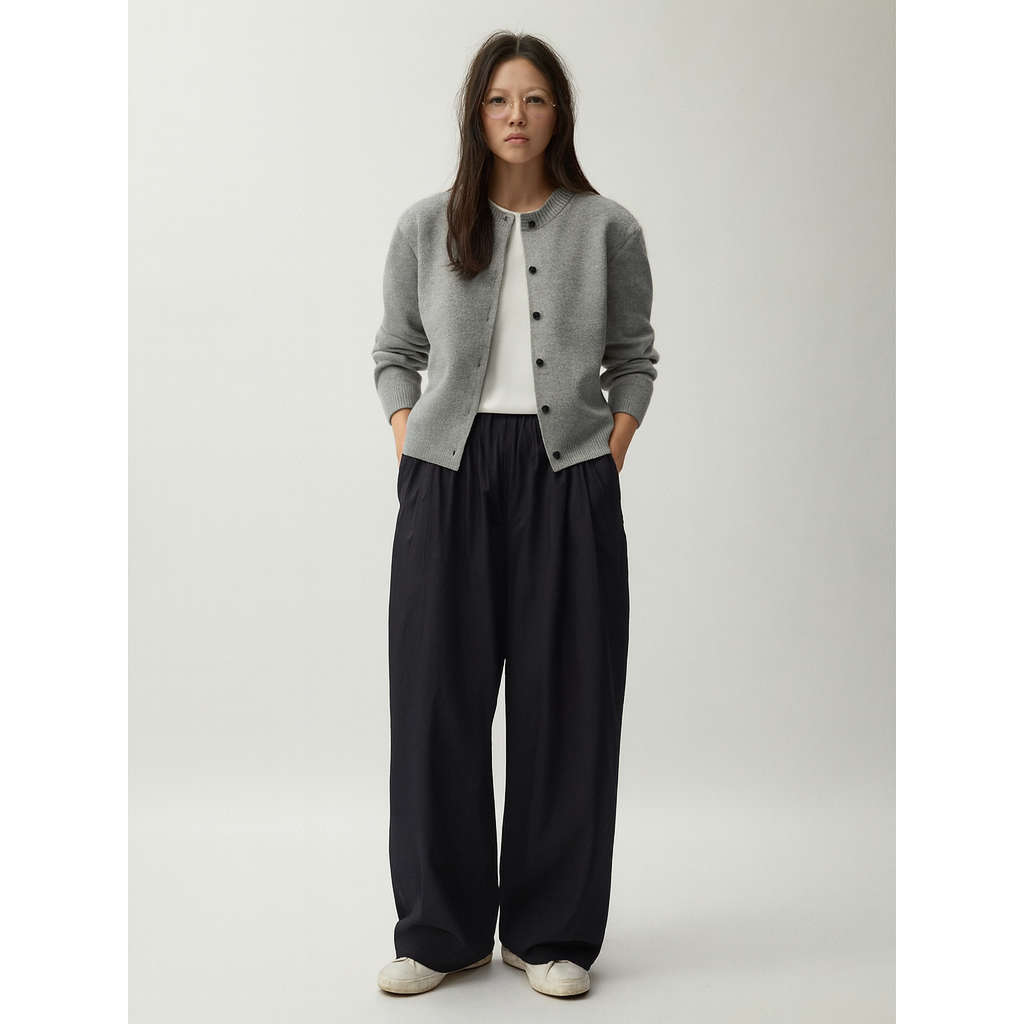 Cropped button knit cardigan worn open as a light layer over a tee