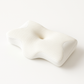 Side angle of the memory foam pillow showing its profile and neck ridge