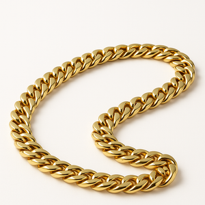 Front view of the gold-tone Cuban link chain necklace showing flat curb links