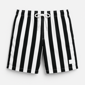 Men's striped swim trunks worn poolside, lifestyle context