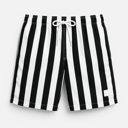 Men's striped swim trunks worn poolside, lifestyle context