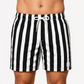 Men's striped swim trunks shown from the side angle
