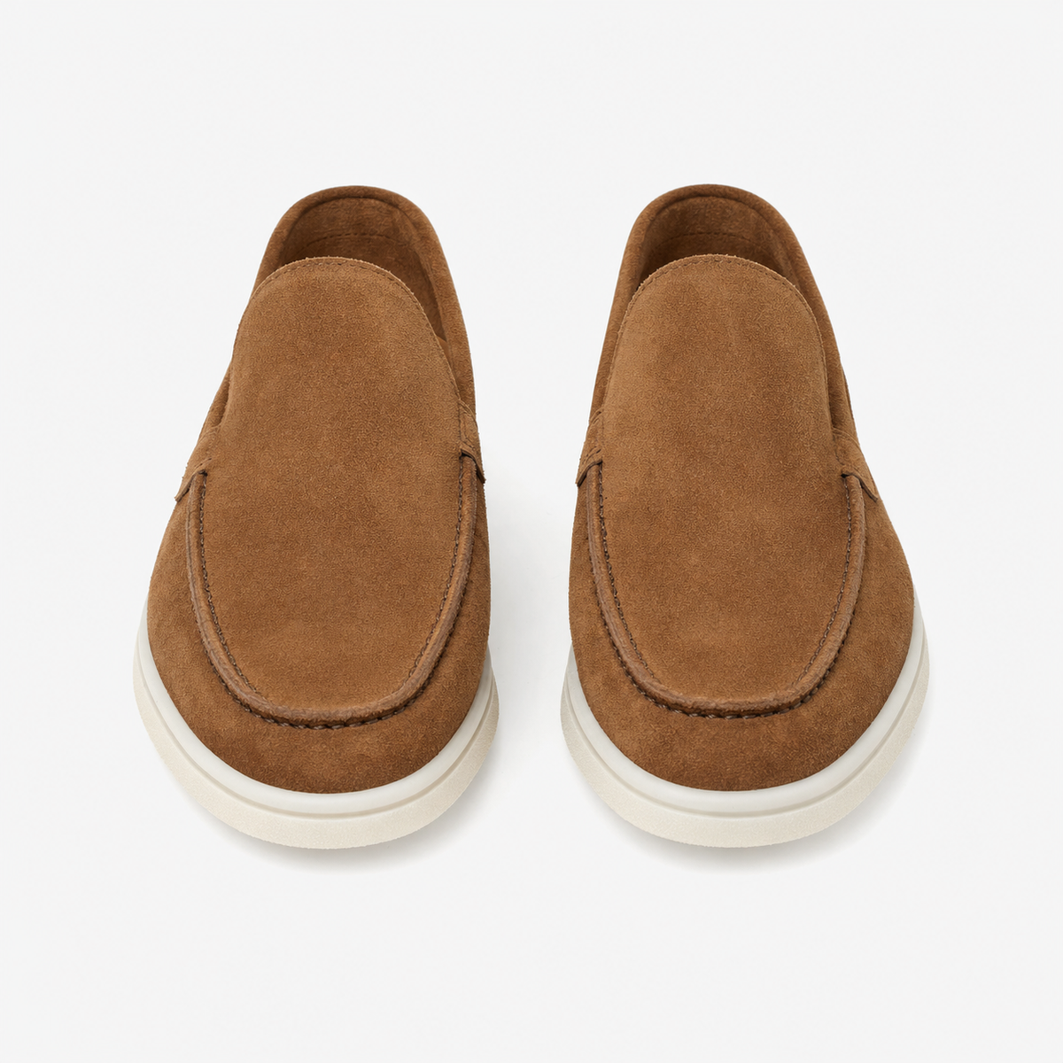 Men's casual slip-on shoe worn while walking outdoors