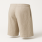 Close-up of the breathable woven fabric and flat seams on the casual shorts