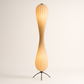 Twisted petal spiral lamp styled on a console beside the wall as an accent light