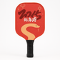 Pickleball paddle held in hand showing the cushioned wrap grip handle