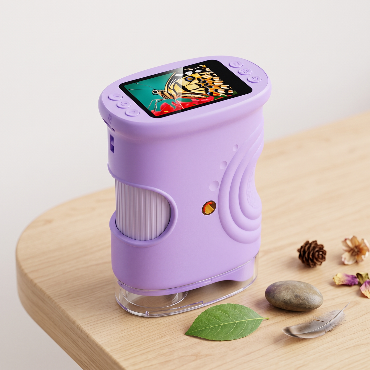 Purple kids digital microscope with natural specimens on a light desk