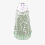 Sequin fishtail halter neck dress photographed against a dark backdrop