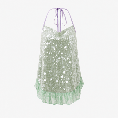 Sequin fishtail halter neck dress photographed against a dark backdrop
