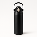 Stainless steel thermos cup with straw on a morning desk by a window