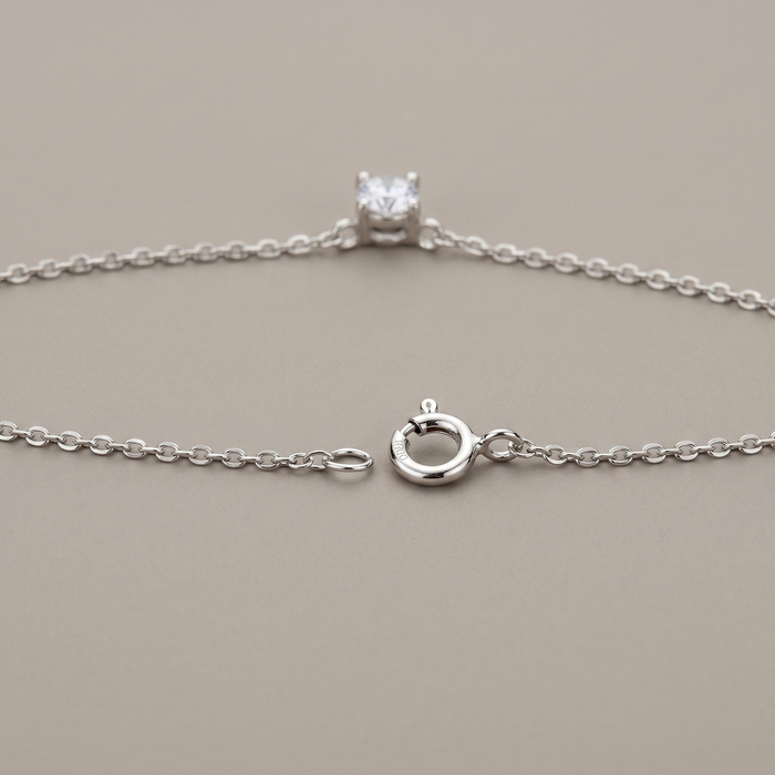 Clasp it at the nape