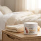Melao stretch mark cream jar on a bedside nightstand