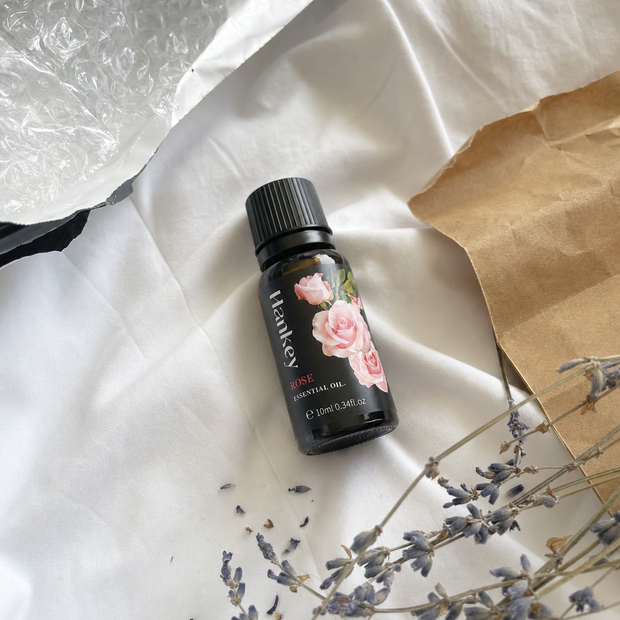 Customer review photo of the rose essential oil bottle just unboxed