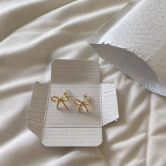 Soline customer photo gold bow stud earrings