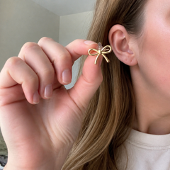 Bram customer photo gold bow stud earrings