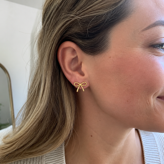 Casper customer photo gold bow stud earrings