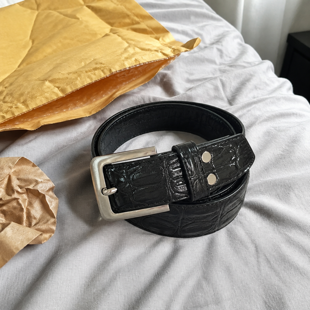 Customer photo of the black crocodile pattern leather belt unboxed at home