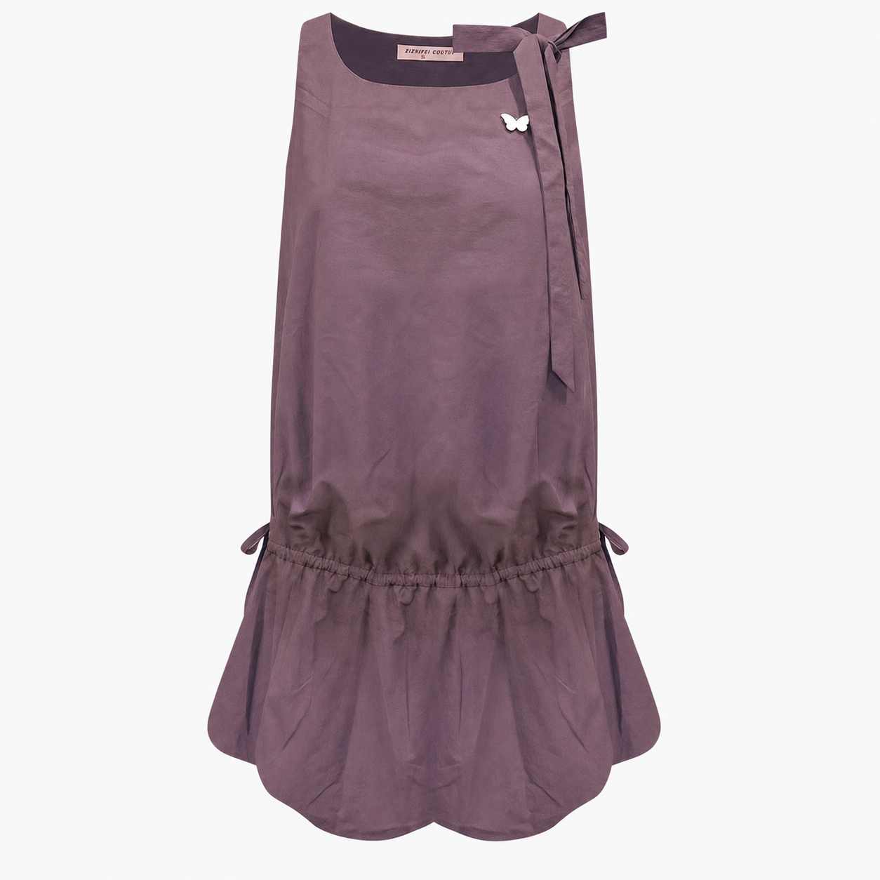 Lace up back camisole dress with embroidered floral hem on model