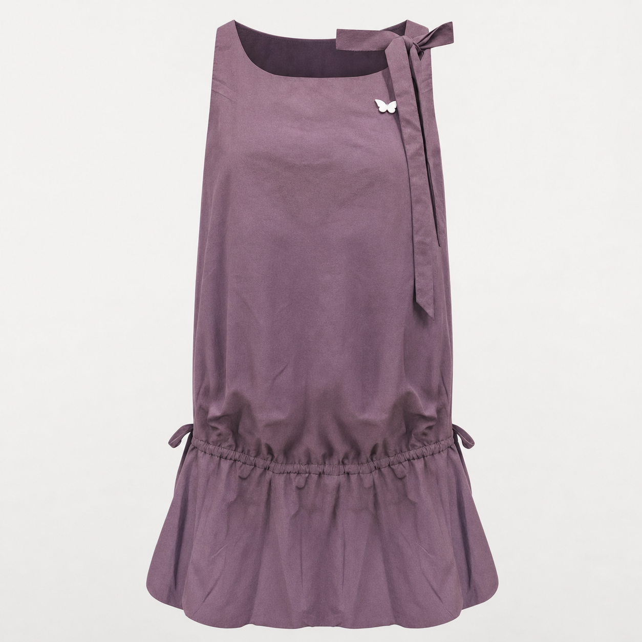 Close up of tonal floral embroidery along the dress hem